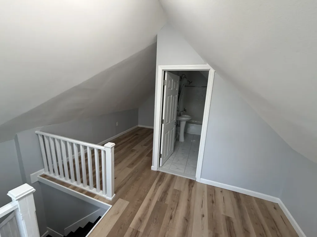 Refreshed interior room with new flooring and trim